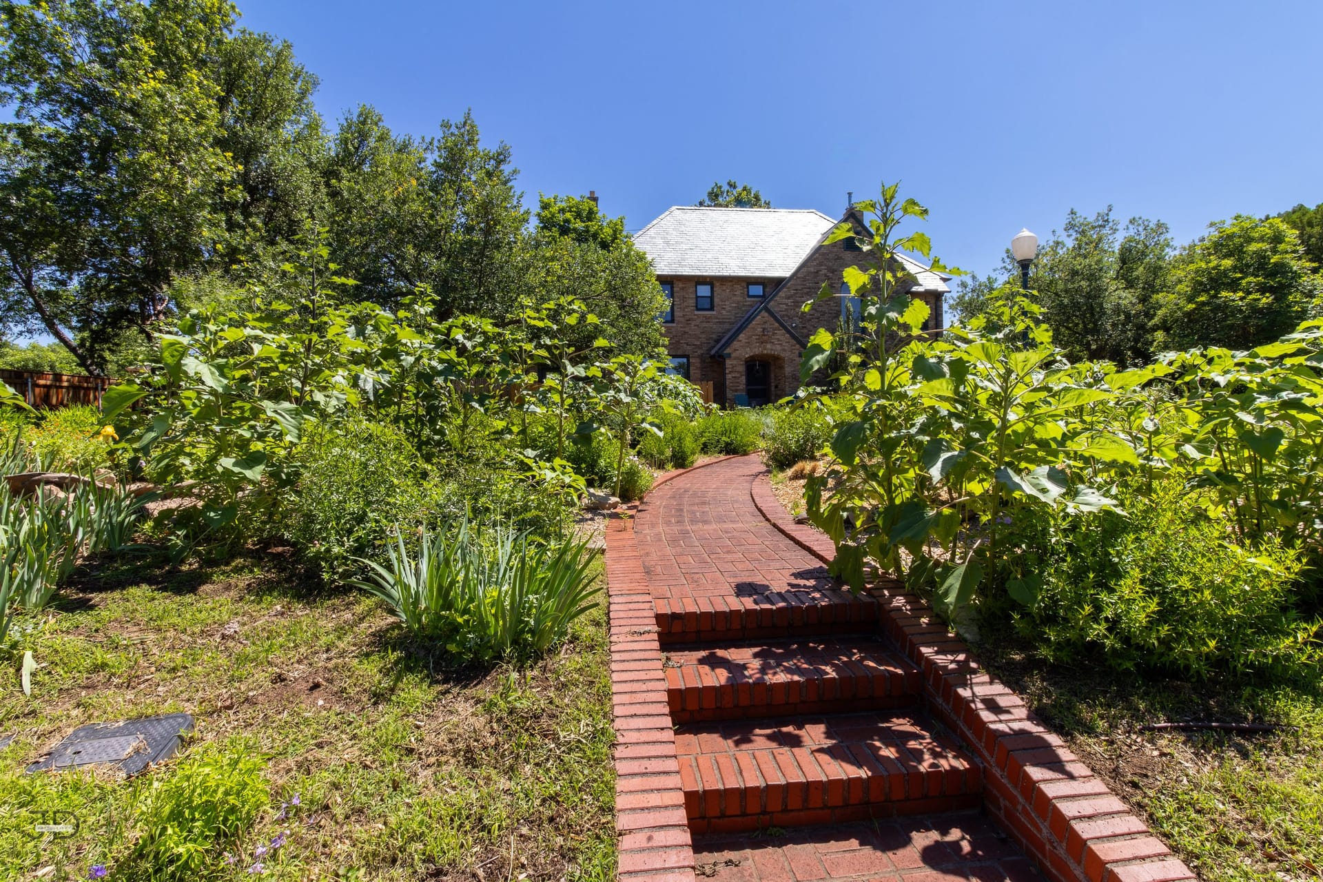 A Texoma historic home with all native gardens surrounding.